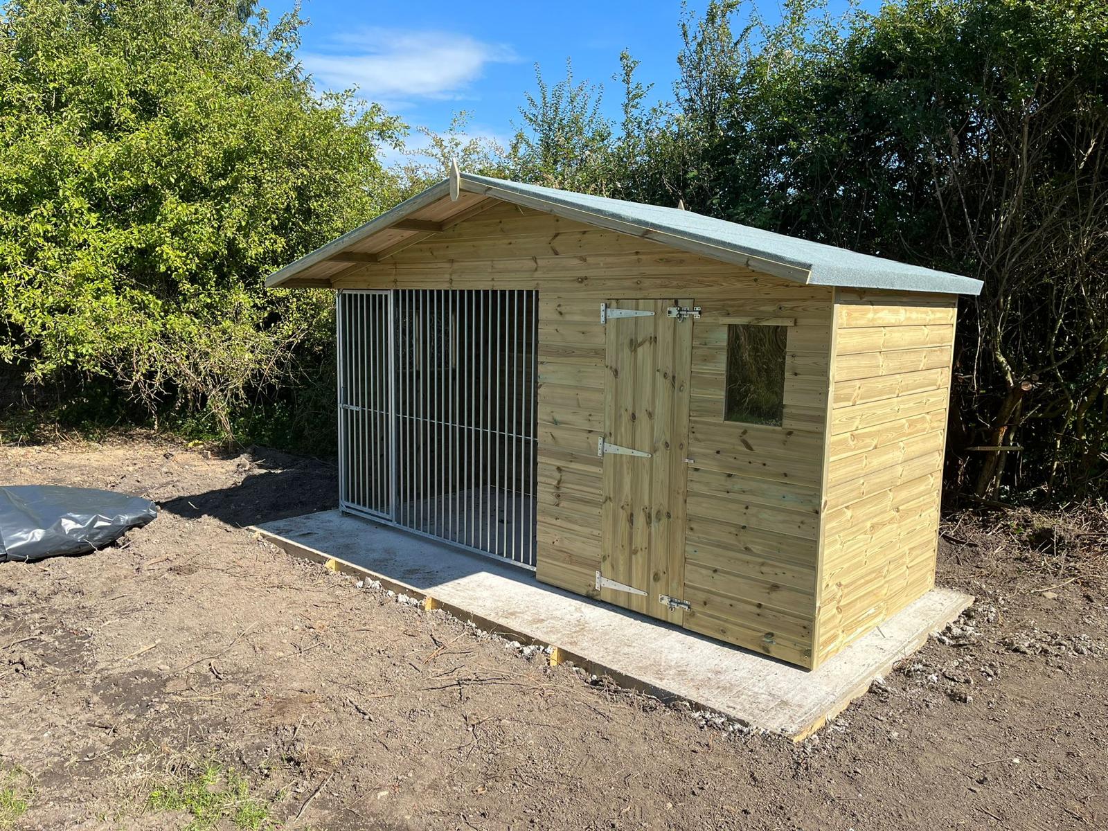 wooden dog kennel and run