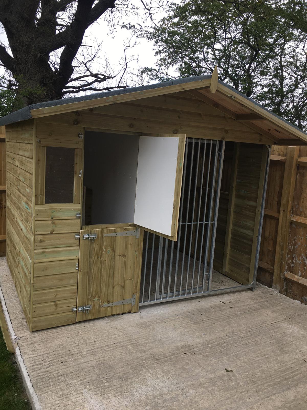 wooden dog kennel and run