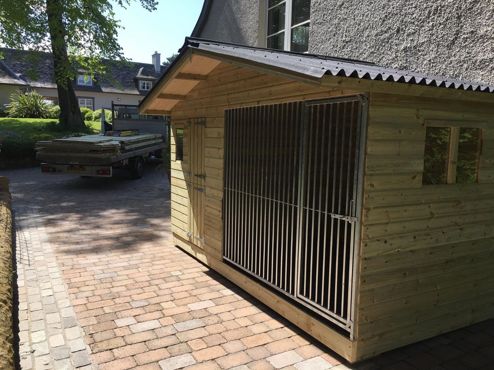 wooden dog kennel and run