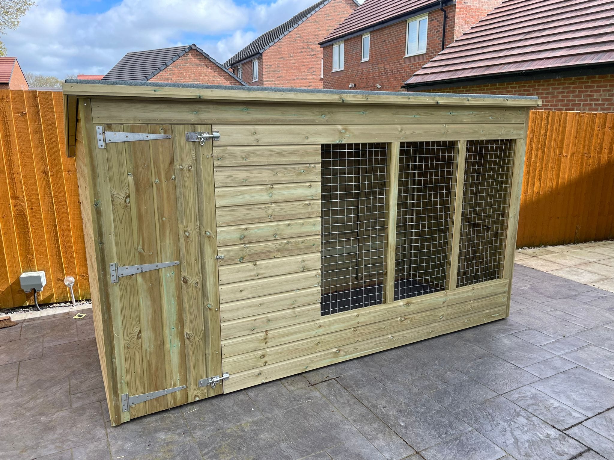 wooden dog kennel and run