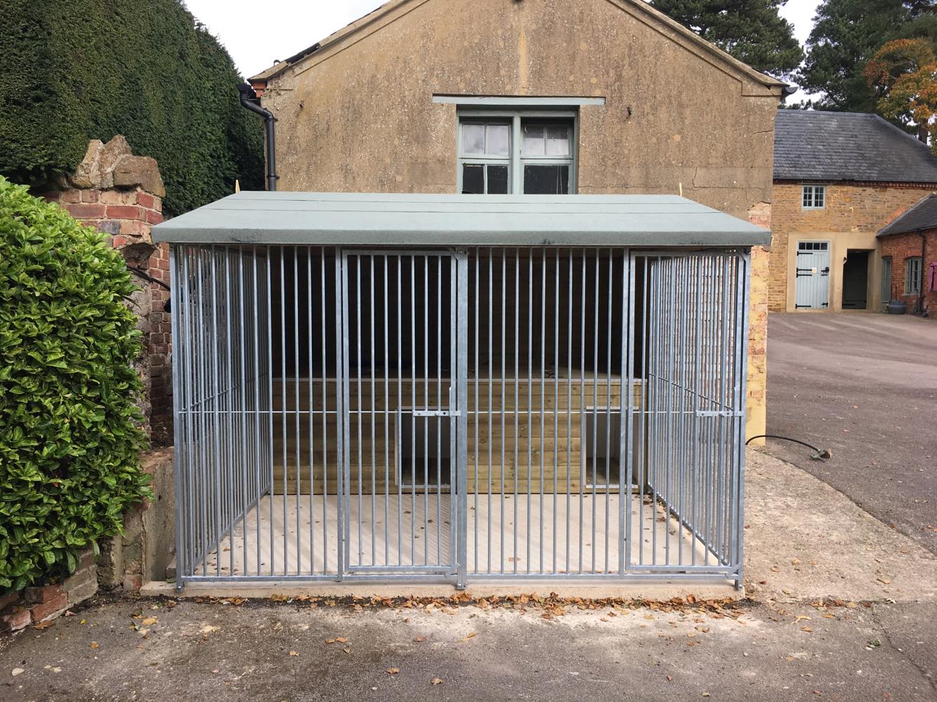 wooden dog kennel and run