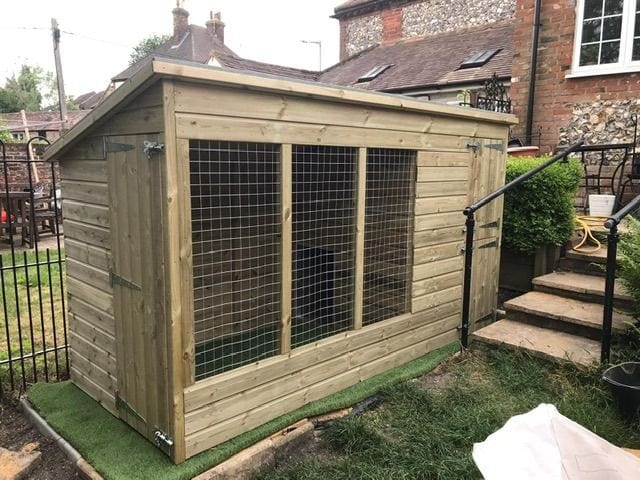 wooden dog kennel and run