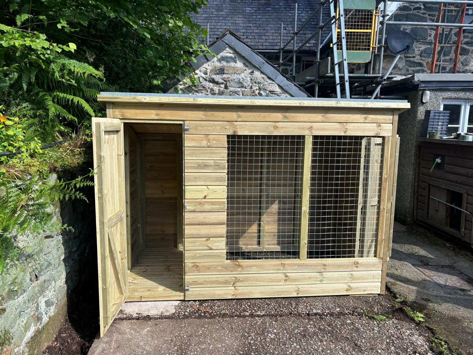 wooden dog kennel and run