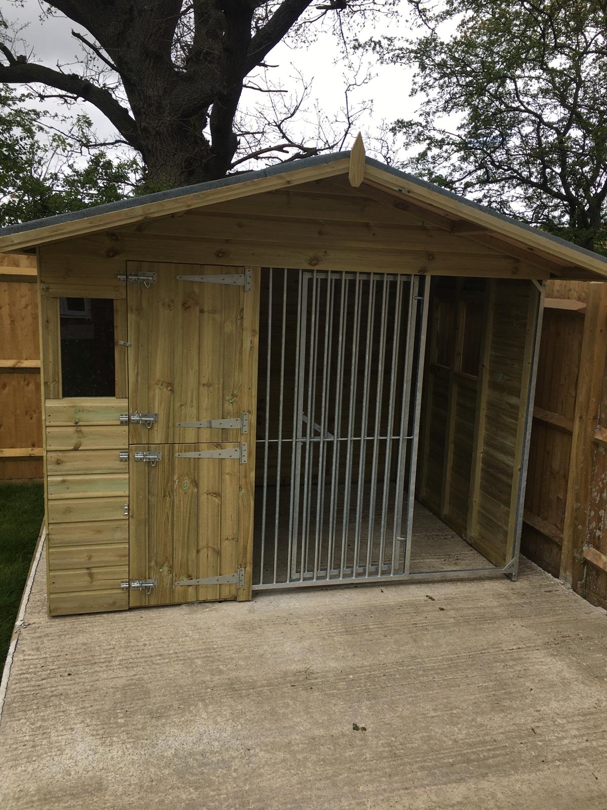 wooden dog kennel and run