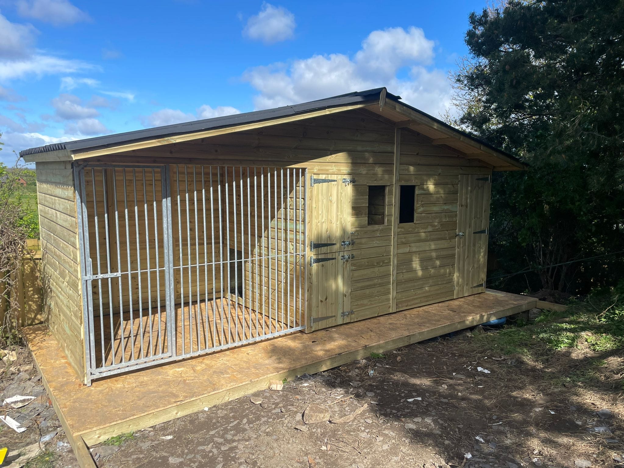 wooden dog kennel and run