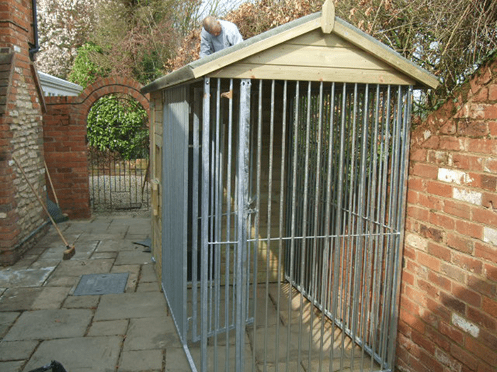 wooden dog kennel and run