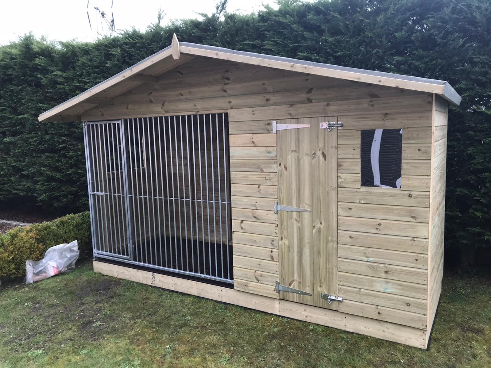 wooden dog kennel and run