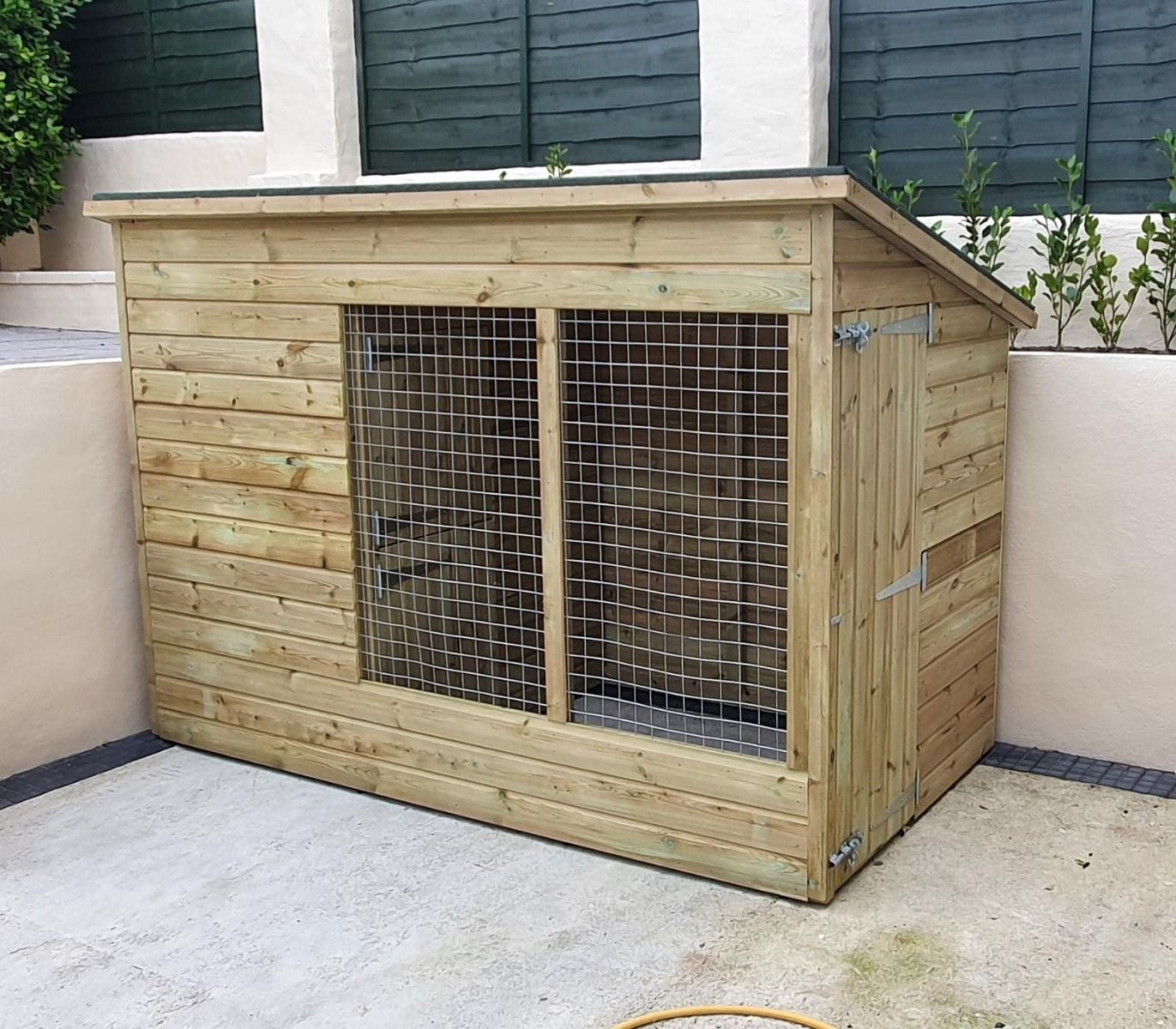 wooden dog kennel and run