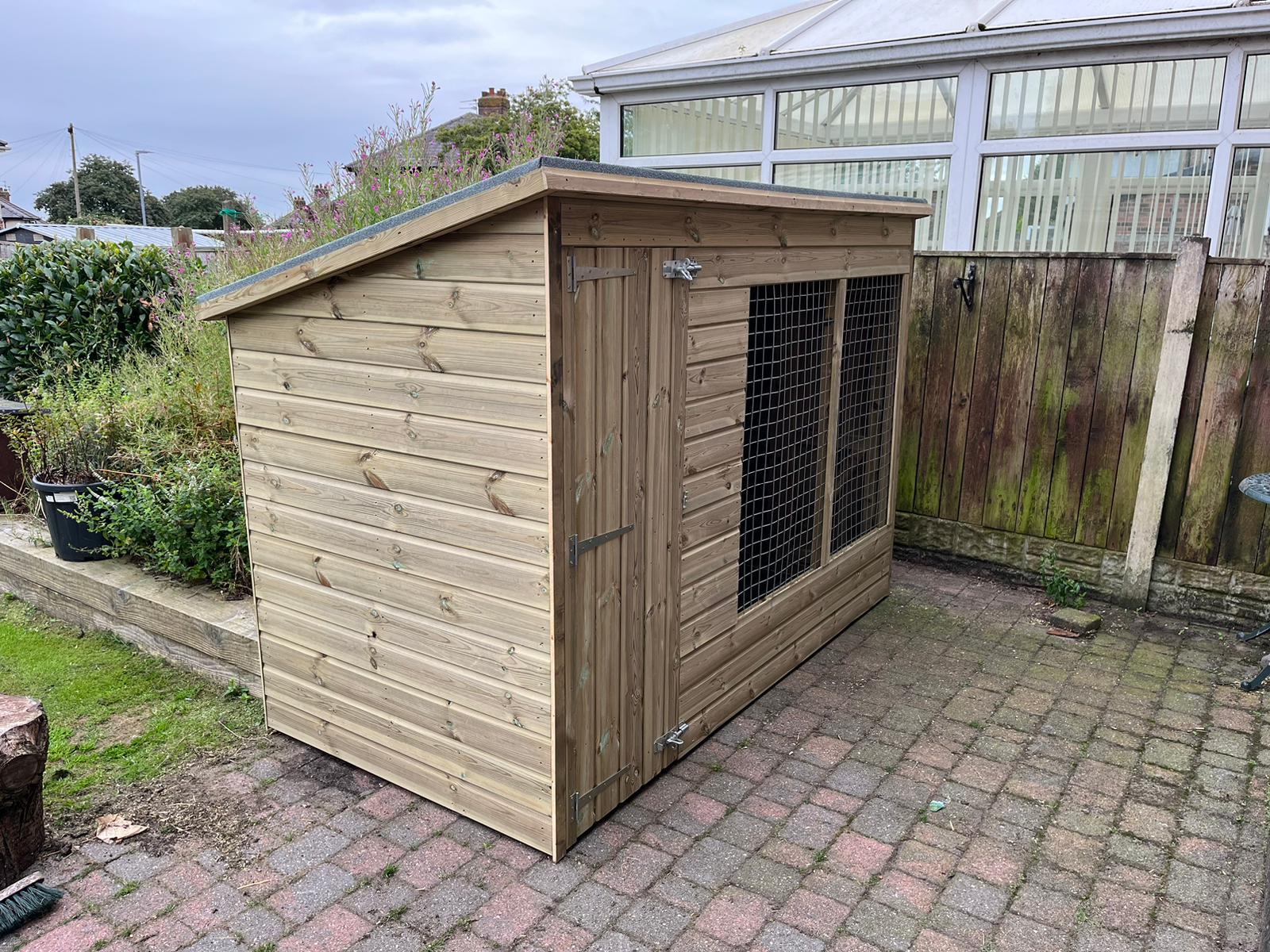 wooden dog kennel and run