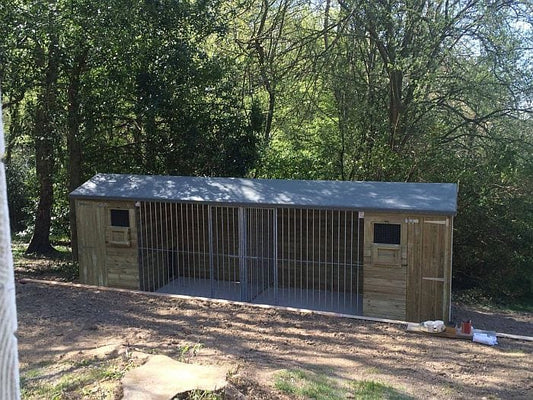 wooden dog kennel and run